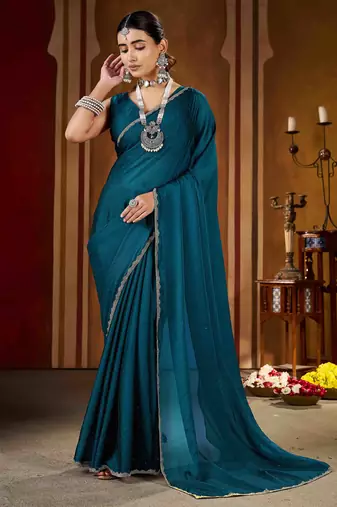 Festive rama green rangoli silk saree with beads lace design