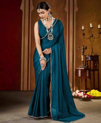 Party wear new rangoli silk rama color saree with blouse and stone lace border 2