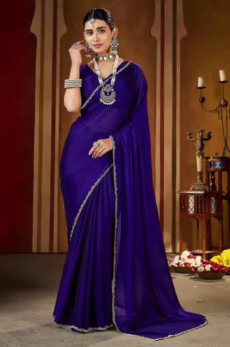 Party wear new rangoli silk violet color saree with blouse and stone lace border