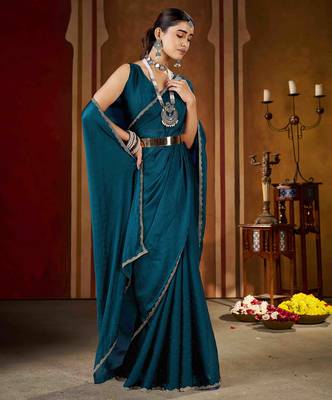 Festive rama green rangoli silk saree with beads lace design 3
