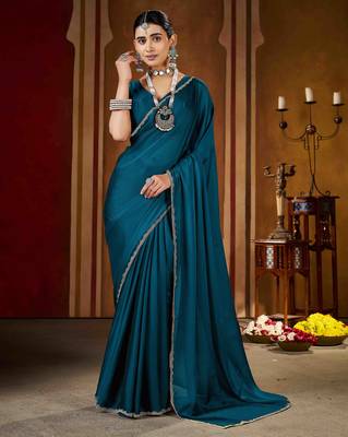 Party wear new rangoli silk rama color saree with blouse and stone lace border 3