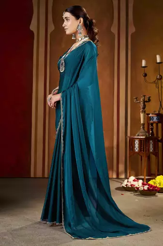 Festive rama green rangoli silk saree with beads lace design