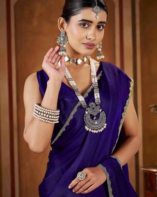 Party wear new rangoli silk violet color saree with blouse and stone lace border 5
