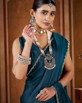 Party wear new rangoli silk rama color saree with blouse and stone lace border 5