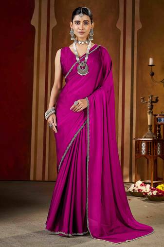 Party wear new rangoli silk pink color saree with blouse and stone lace border
