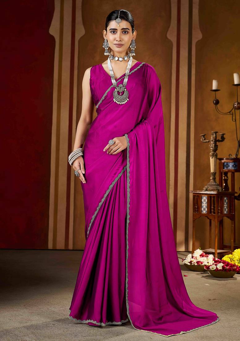 Party wear new rangoli silk pink color saree with blouse and stone lace border