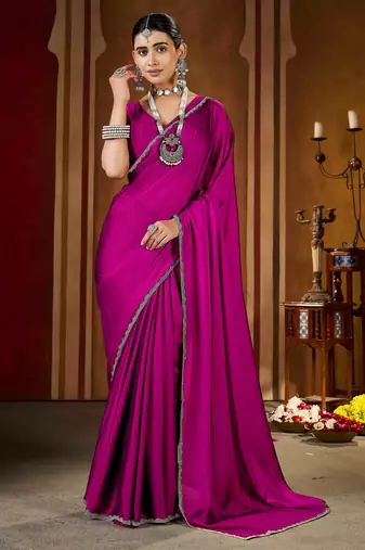Party wear new rangoli silk pink color saree with blouse and stone lace border