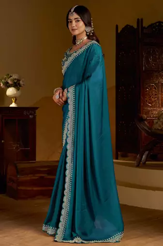 Rama green rangoli silk saree with heavy embroidery work and heavy work