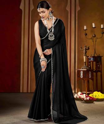 Party wear new rangoli silk black color saree with blouse and stone lace border 2