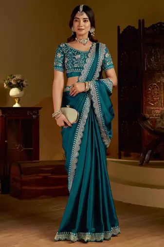 Rama green rangoli silk saree with heavy embroidery work and heavy work