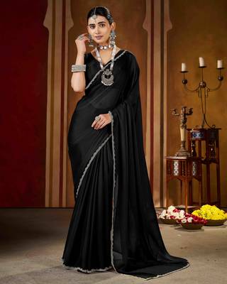 Party wear new rangoli silk black color saree with blouse and stone lace border 3
