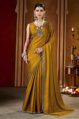 Party wear new rangoli silk golden color saree with blouse