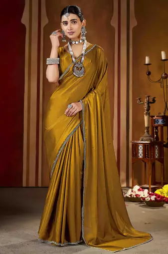 Party wear new rangoli silk golden color saree with blouse