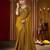 Party wear new rangoli silk golden color saree with blouse