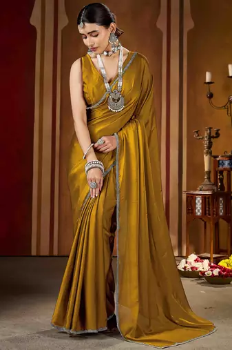 Party wear new rangoli silk golden color saree with blouse