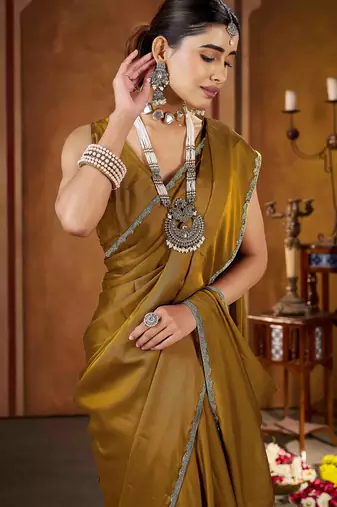 Party wear new rangoli silk golden color saree with blouse