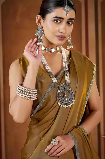 Party wear new rangoli silk golden color saree with blouse