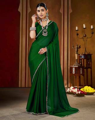 Party wear new rangoli silk green color saree with blouse and stone lace border 3