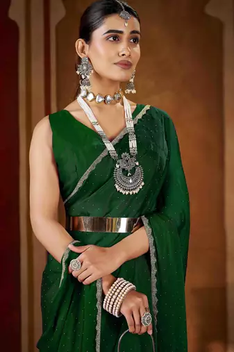 Soft green rangoli silk saree with beads lace and stones