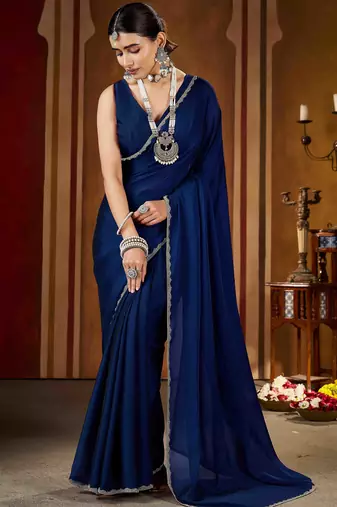 Party wear navy blue rangoli silk saree with fancy lace border