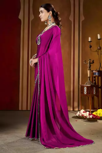 Wedding wear pink rangoli silk saree with stone work border