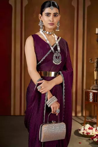 Traditional wine  rangoli silk saree with stone lace work