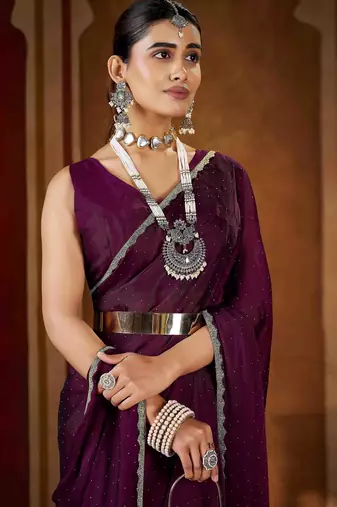 Traditional wine  rangoli silk saree with stone lace work