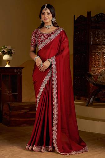 Maroon rangoli silk saree with heavy embroidery work and heavy work blouse