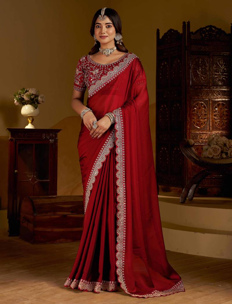 Maroon rangoli silk saree with heavy embroidery work and heavy work blouse