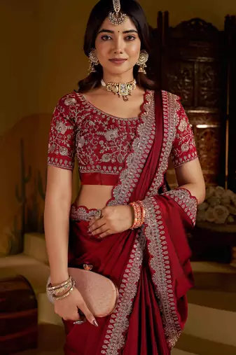 Maroon rangoli silk saree with heavy embroidery work and heavy work blouse