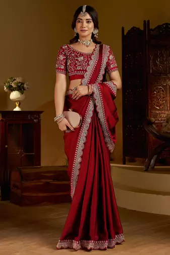 Maroon rangoli silk saree with heavy embroidery work and heavy work blouse