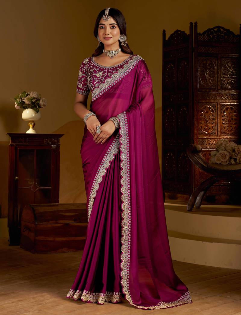 Rani pink rangoli silk saree with heavy embroidery work and heavy work