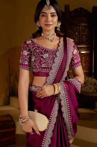 Rani pink rangoli silk saree with heavy embroidery work and heavy work