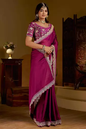 Rani pink rangoli silk saree with heavy embroidery work and heavy work