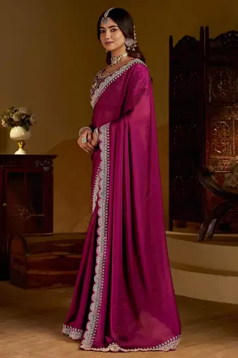 Rani pink rangoli silk saree with heavy embroidery work and heavy work