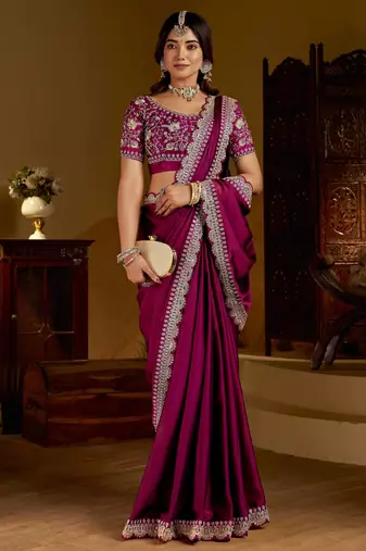 Rani pink rangoli silk saree with heavy embroidery work and heavy work