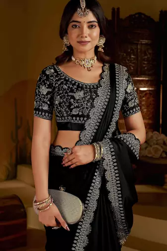 Black rangoli silk saree with heavy embroidery work and heavy work