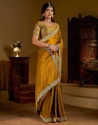 Gold rangoli silk saree with heavy embroidery work 3