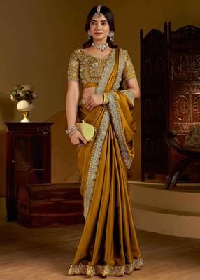 Gold rangoli silk saree with heavy embroidery work 5