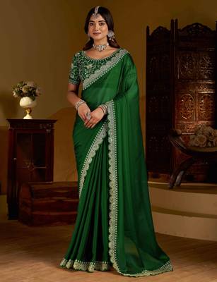 Green rangoli silk saree with heavy embroidery work 1