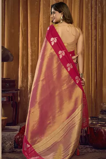 Peach soft tissue contrast border with jhallar saree