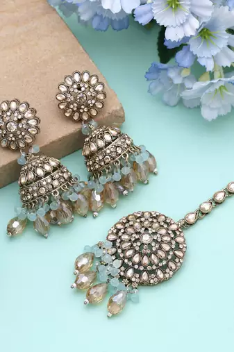 Sky blue color kundan earrings tikka set