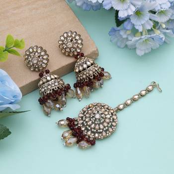 Maroon color kundan earrings tikka set 1