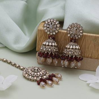 Maroon color kundan earrings tikka set 2