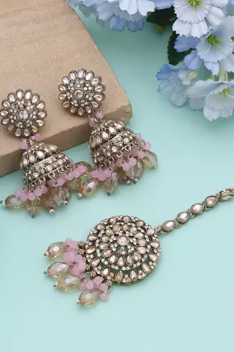 Pink color kundan earrings tikka set