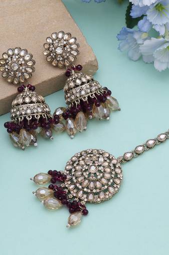 Purple color kundan earrings tikka set