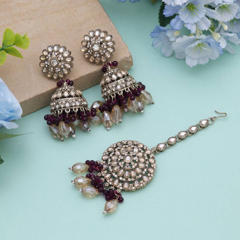 Purple color kundan earrings tikka set