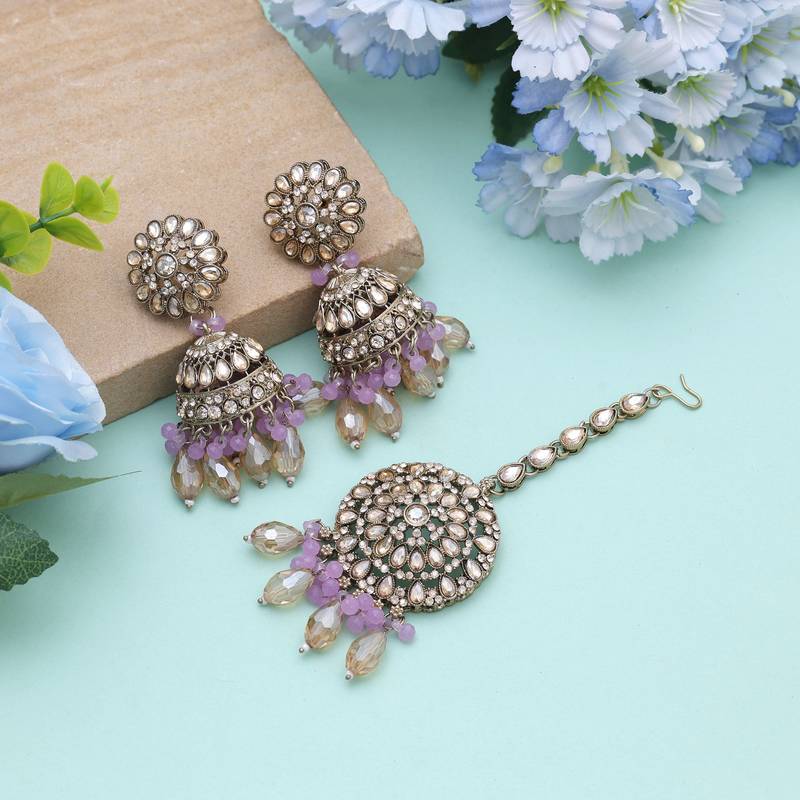Light purple color kundan earrings tikka set