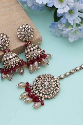 Rani color kundan earrings tikka set