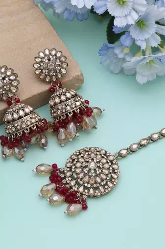 Rani color kundan earrings tikka set